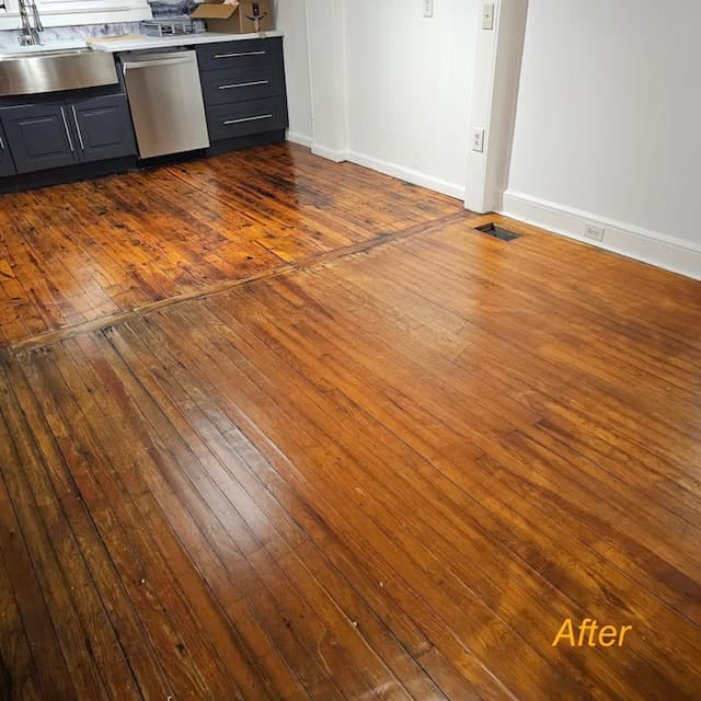 Kitchen hardwood floor with grey cabinets — deep cleaned and recoated
